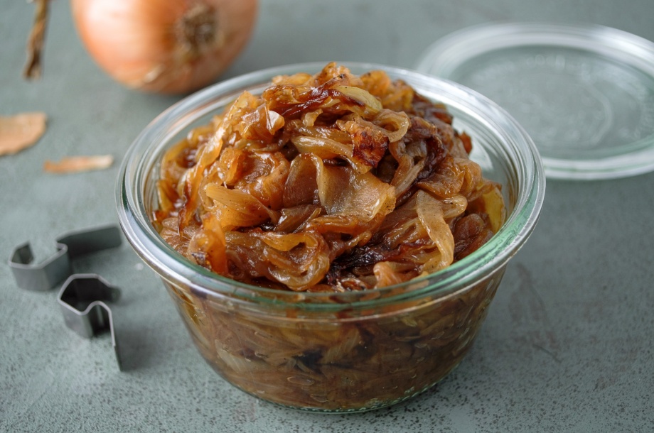 A jar of caramelized onions cooked low and slow for richness and depth of flavor