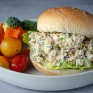 Classic chicken alternative chickpea salad sandwich on a roll made form chick peas, mayo, and dill. Easy, healthy, filling, plant-based, dairy-free, vegan recipe
