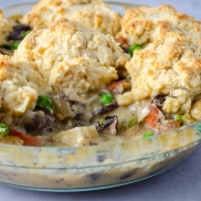 A classic vegetable pot pie with carrots, green peas, mushrooms, potatoes, and a quick and easy biscuit topping crust. Easy, healthy, filling, plant-based, dairy-free, vegan recipe