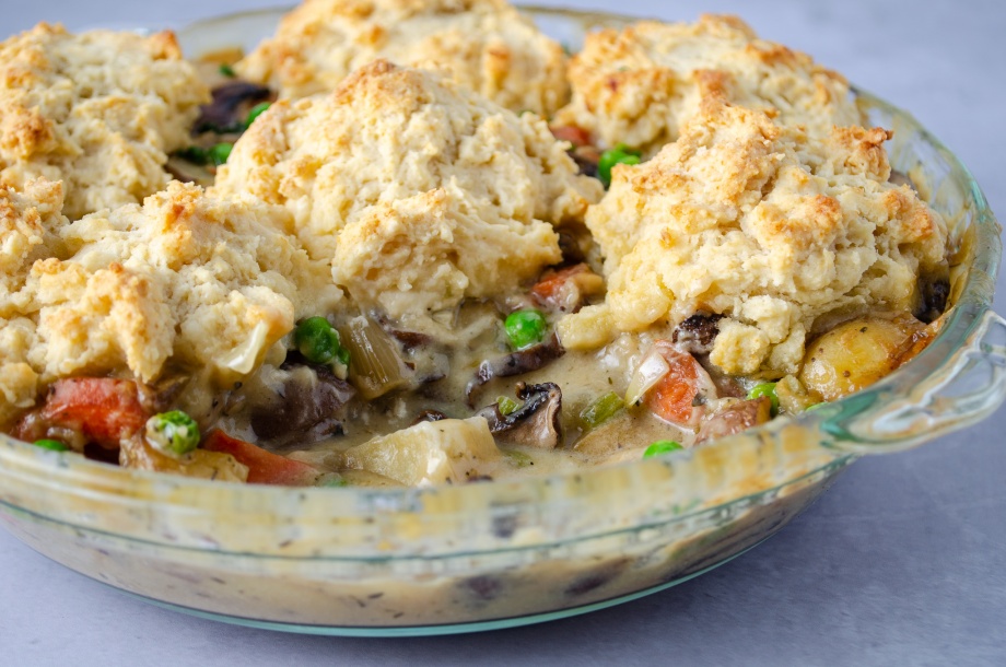 A classic vegetable pot pie with carrots, green peas, mushrooms, potatoes, and a quick and easy biscuit topping crust. Easy, healthy, filling, plant-based, dairy-free, vegan recipe