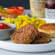 Meatless and plant-based (sausage-alternative) Breakfast Patties served with ketchup and tofu scrambled eggs