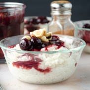 Coconut Rice Pudding topped with homemade Mixed Berry Sauce