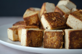 A plate of gorgeously brown simple seared tofu cubes