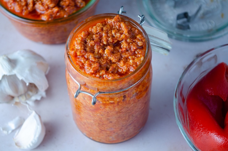 A jar of flavor-packed, easy, homemade, vegan sundried tomato pesto