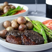 Grilled Portobello Mushroom "steak" with red wine mushroom sauce and served with asparagus and potatoes