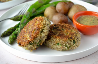Quick and easy vegan quinoa cakes with asparagus and potatoes and a mustard pan sauce