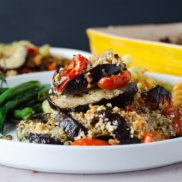 A tray of crispy and delicious vegan, plant-rich baked eggplant parmesan that is quick and easy to make