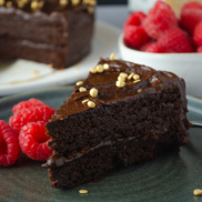 A fudgey, rich, decadent chocolate cake that's dairy-free, gluten-free, vegan, and super easy to make
