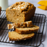 Warm, autumnal, pumpkin spice bread loaf that's vegan, dairy-free, and delicious