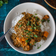 A warm, hearty, plant-based entree of lentil stew flavored with curry