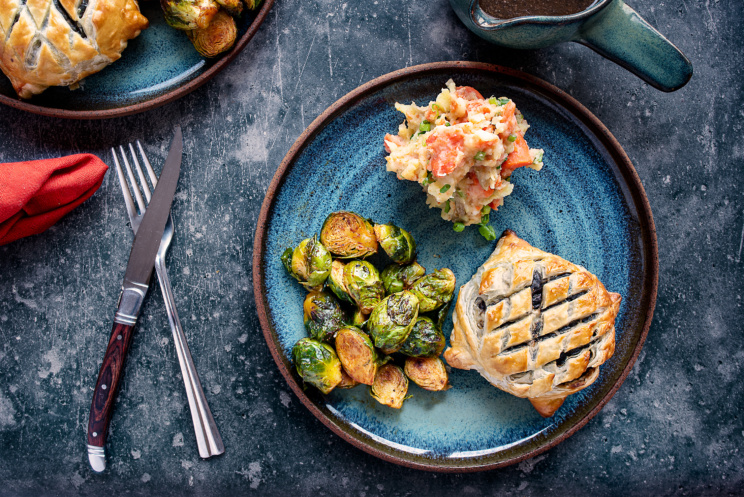 A festive, vegan alternative to beef wellington made with portobello mushrooms, caramelized onions, and a flaky, golden, puff pastry