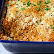 A casserole of white bean and orzo gratin topped with seasoned breadcrumbs and herbs and flavored with mediterranean inspired flavorings for a delicious, plant-based dinner idea