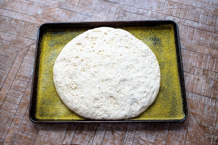 A sheetpan for pizza crust that's simple, quick, and turns out crispy and wonderful every time