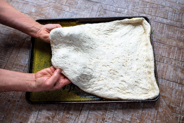 A sheetpan for pizza crust that's simple, quick, and turns out crispy and wonderful every time