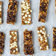 A tray of homemade, no-bake granola bars packed with plant-based, all-natural, energy-packed ingredients like oats, dates, nuts, and fruit